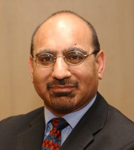 image of dr hussain non executive director at the trust