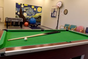 Photo of a pool table on a ward