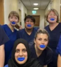 The Oral Health Improvement team wearing blue lips to mark Mouth Cancer Action Month