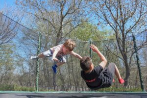 Children playing on a trampoline 