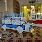 A photograph of the 'brush bus' used to store children's toothbrushes to keep them clean at school