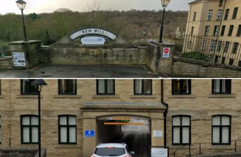 Image of New Mill sign and tunnel leading to entrance