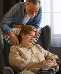 Photograph of couple looking at old photos