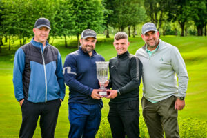 Photo of winners with the trophy