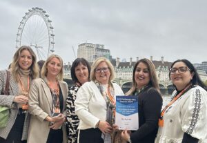 Photograph of the PACT team with their Parliamentary Award