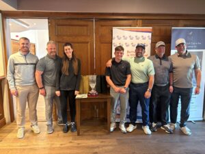 Group of people at a golf club presentation