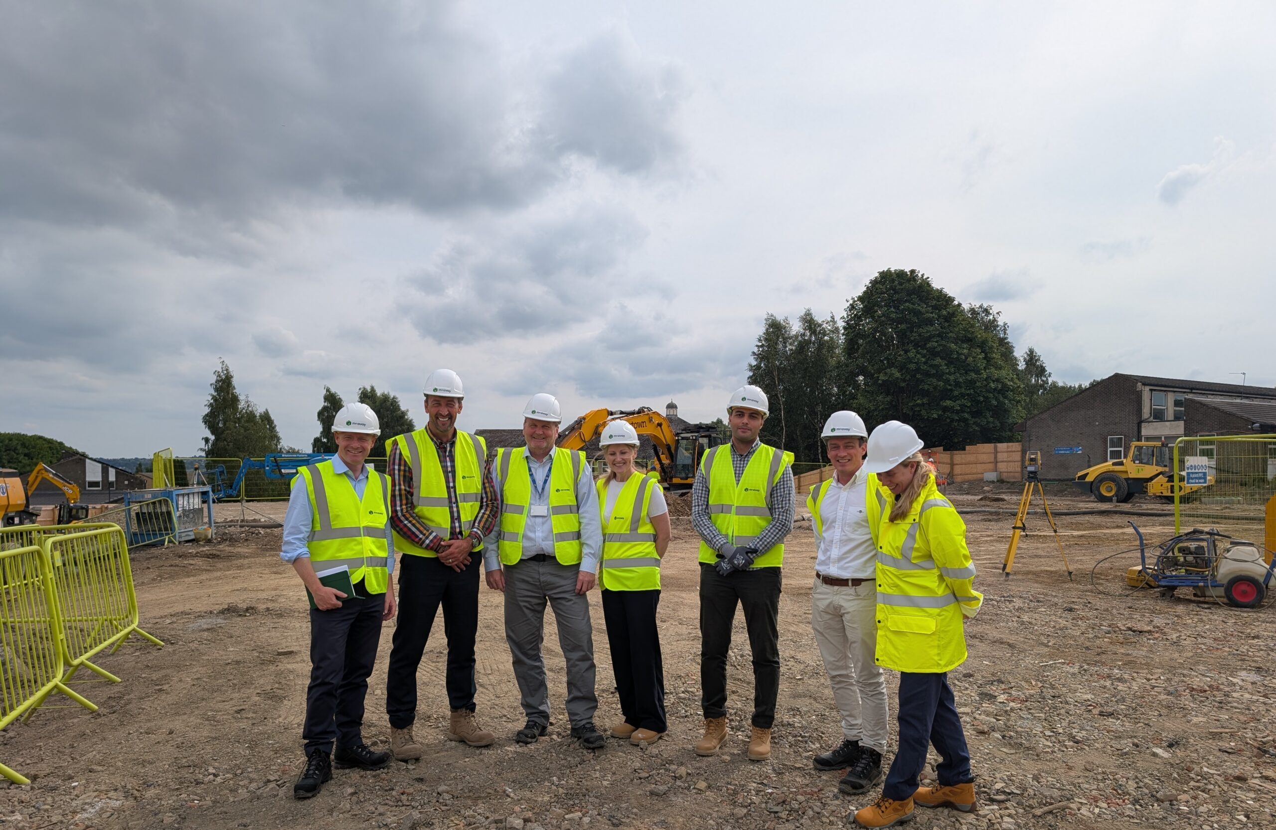 Robbie Moore pictured on the construction site at Lynfield Mount Hospital with members of the project redevelopment team.