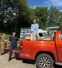 Joe Courtney (left) collecting planters